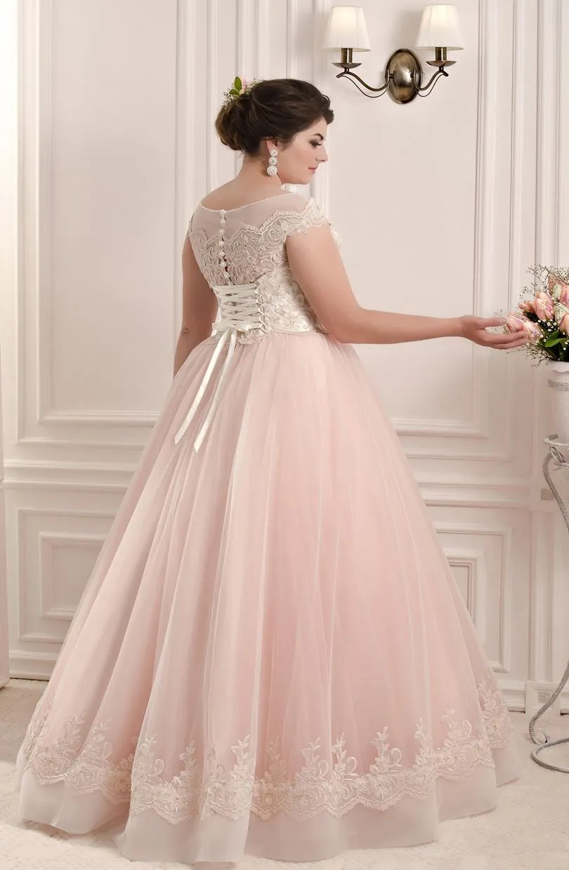 ---Beautiful pearl pink wedding dress for plus sizes for sale online with boat neckline and short sleeves made of tulle with lac